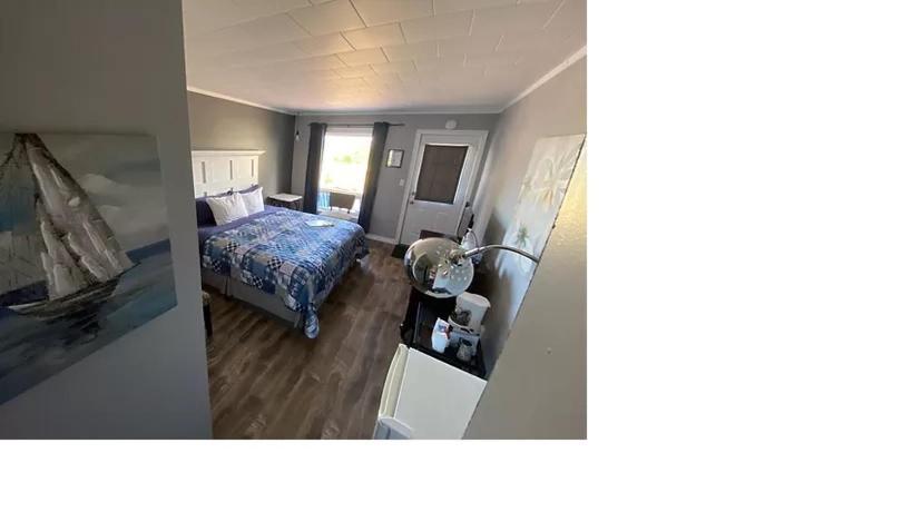 The Pines Motel And Cottages Rustico Exteriör bild